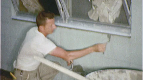 1960s Man Installing Window Frame Mortar Home Remodel Vintage Film Home Movie 스톡 동영상 33425961