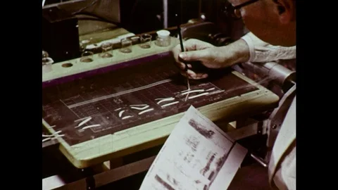 1960s: Man Paints Speech Patterns on to Plastic Sheet Stock Footage 74827526