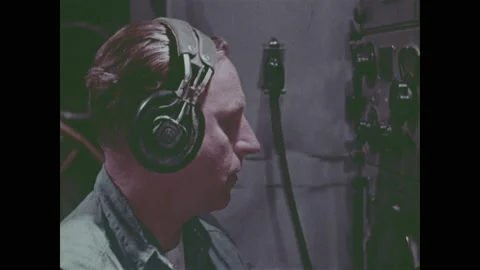 1960s: Man turns knobs in control room.  Ship.  Airplanes and helicopters over 스톡 동영상 151605980