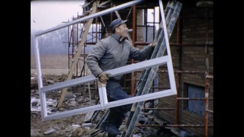 1960s Man Window Frame Installation CONSTRUCTION SITE Vintage Film Home Movie Stock Footage
