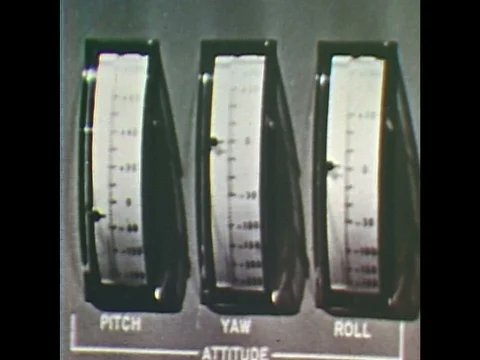1960s: Manual controls inside space capsule. Yaw, Pitch and Roll. Roll Number Stock Footage 84736324
