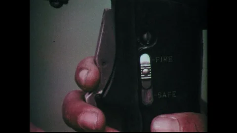 1960s: Marine pulls trigger and anti-tank gun fires. Tank blows up. Man welds on 動画素材 90349391