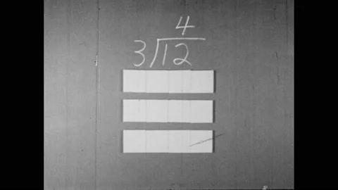 1960s: Math problem on chalkboard. Animated squares divided evenly underneath. Stock Footage 156431452
