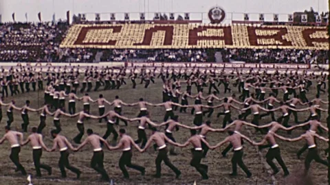 1960s Men Do Calisthenics Mass Workout Exercise Get In Shape Vintage Film Movie Stock Footage
