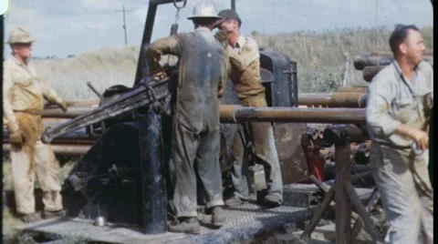 1960s Men at Work WORKERS Oil Well Drill Rig Vintage Industrial Old Film Movie 스톡 동영상 11858971