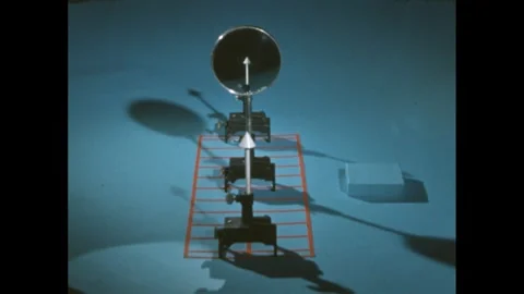 1960s: Mirror between two objects all arranged on a grid. Stock Footage 247158563