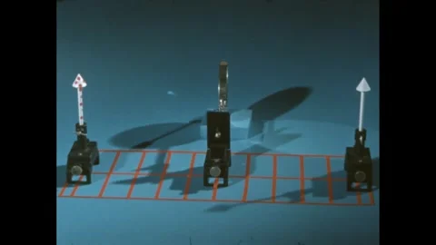 1960s: Mirror tipped on it's side between two objects. Stock Footage 247158585