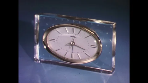 1960s: Montage of different clocks. Stock Footage