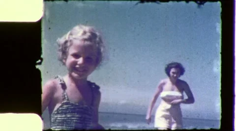 1960s MOTHER AND DAUGHTER at the Beach Vintage Old Film Home Movie Stock Footage