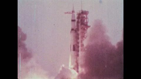 1960s: NASA space rocket taking off from ground, mid way shots of rocket Stock Footage