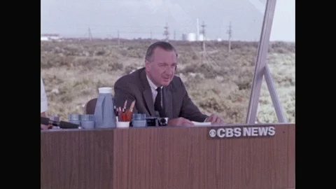 1960s: News anchors sit at desks and speak. Stock Footage