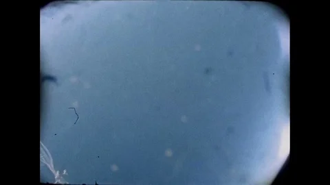1960s: Parachute in sky. 스톡 동영상 109219151