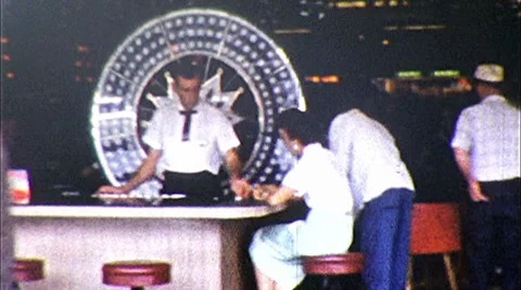 1960s People Gamble Roulette Wheel Reno Casino Las Vegas Vintage Film Home Movie Stock Footage