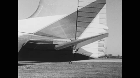 1960s: Person in cockpit of airplane pulls back on steering wheel. Elevators on Stock Footage 144694698