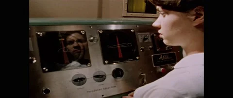 1960s: person getting MRI, technician observing ongoing MRI, woman with head 스톡 동영상 160169766