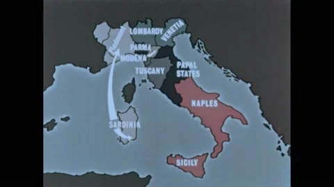 1960s: Priests speak.  Animated map of Italy.  Building.  Man uses tool to break Vídeos de archivo 205311366
