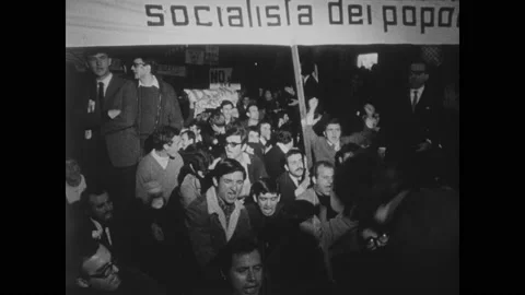1960s: Protestors flood streets of Rome, Italy. Police chase protestors in Stock Footage