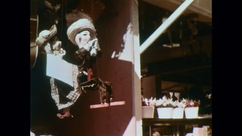 1960s: Puppets Hanging on a Stall Stock Footage 74840299