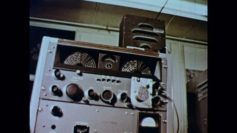 1960s: Recording instruments in a lab. Scientist marks plot points on a graph. Stock Footage 126014630