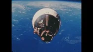 1960S: Rocket Capsule In Space. Rocket Capsule In Space Above Earth. Stock Footage