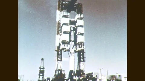 1960s: Rocket on launch pad Stock Footage