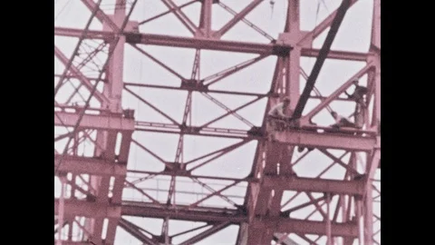 1960s: Rocket launch pad. Men working on launch pad. Building. Vídeos de archivo 101404033