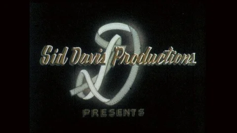 1960s: Sid Davis productions title card. Graffiti text painted on brick wall. Stock-Footage 83218665