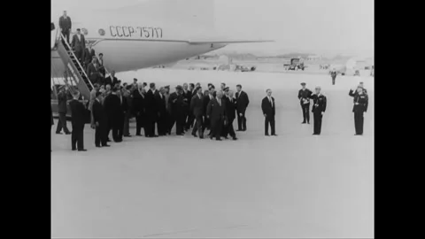 1960s: Skiers return to mountain base; Khrushchev and Eisenhower arrive in Paris Stock Footage 155554690