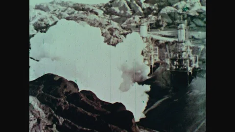 1960s: Smoke from rocket engine fills valley at test site. Test rocket engine Stock Footage 124817366