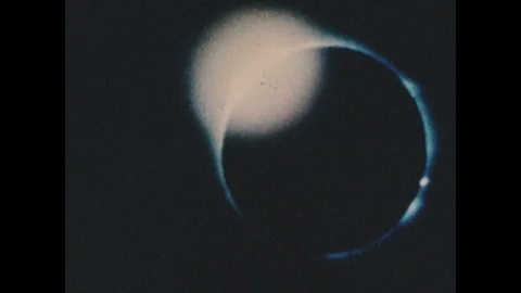 1960s: Solar eclipse. Illustration of planets. Stock Footage 116987697