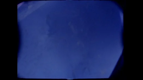 1960s: Spacecraft window.  Reflection of parachute. Video stock 109219049