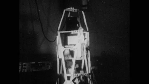 1960s: Structural model of satellite undergoing test. Satellite undergoing Stock Footage 145379375