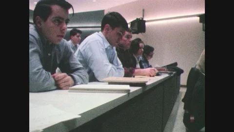 1960s: Students take notes and some raise their hands. Stock Footage 92098304