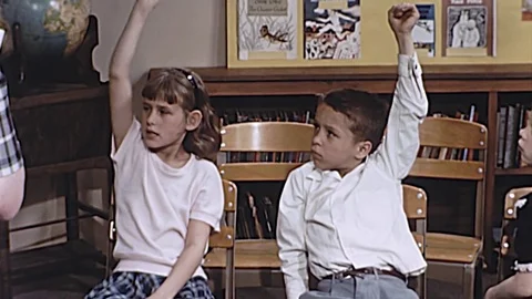 1960s Teacher Students Raise Hands Question School in Class Vintage Film Movie Stock-Footage 80942489