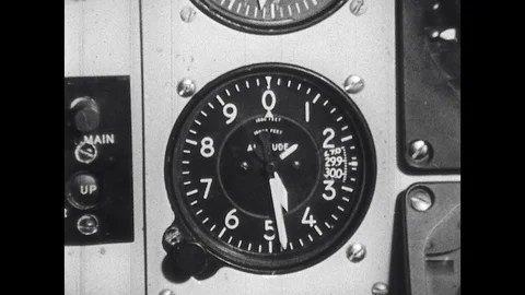1960s: Test pilot in model cockpit with engineering psychologist for experiment. Stock Footage 129971690