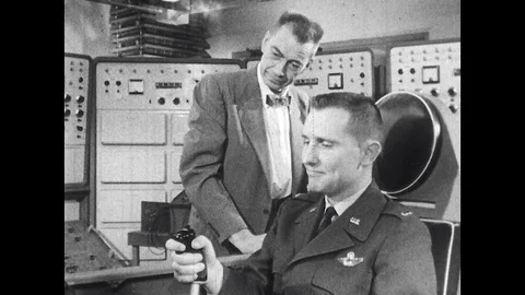 1960s: The test pilot takes up the joystick and begins the experiment, Stock Footage 129971725