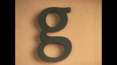 1960s: Text: chair and table in lower case. Text: lower case letter g. Text: Stock Footage 240680966