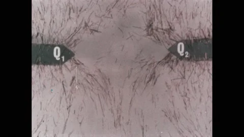1960s: Text with units of measurement = 1 coulomb=6.25 x 10 to power of 18. Stock Footage 221103404