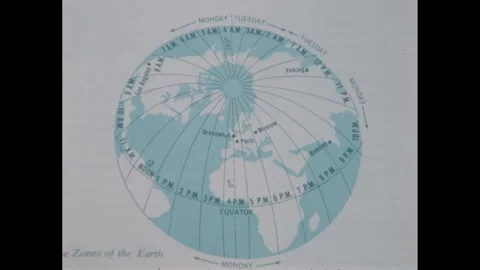 1960s: Time zone map appears in geography text book. Hand with pencil writes in Stock Footage 249613462