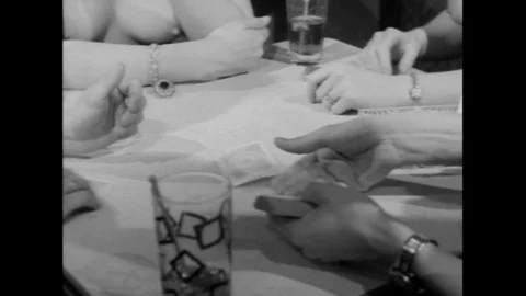 1960s - Topless couples play strip poker. Stock-Footage 142786202