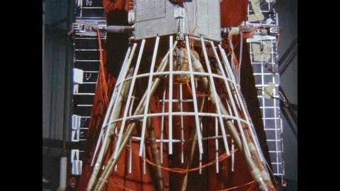 1960s: Transmitter and antenna of prototype satellite. Folded solar panels and Stock Footage 95288982