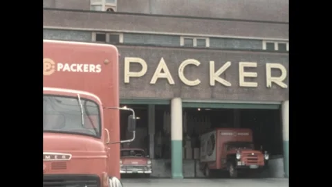 1960s: Trucks parked at loading dock. | Stock Video | Pond5
