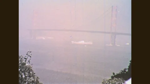 1960s: UNITED STATES: boats on water. Lady gardens on balcony. Ladies speak Stock Footage