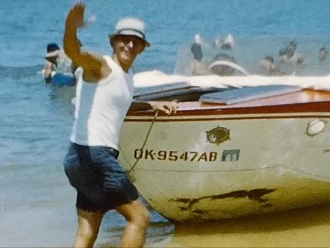 1960s Video of a Man Pushing a Boat Into a Lake Vidéo 342000575