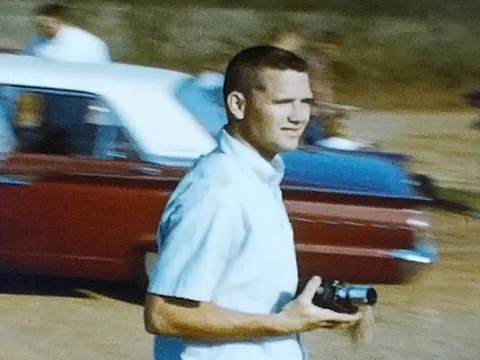 1960s Video of a Man Walking with a Camera Vídeos de archivo 339305982