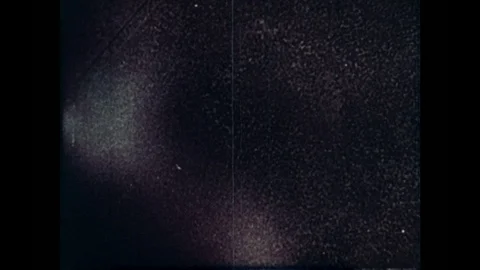 1960s: View of earth from rocket as it launches into space. View rotates around Stock Footage 82730842