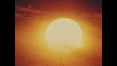 1960s: View of sun.  View of sky. Solar eclipse. Stock Footage 116987626