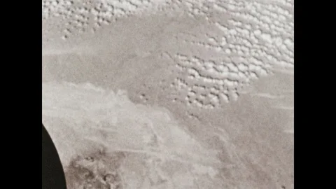 1960s: Visual of Earth's resources and conditions of soil. Men use simulator Stock Footage 101667027