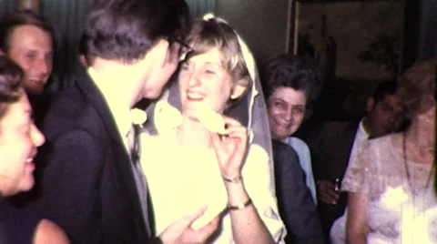 1960s WEDDING Day Bride Feeds Groom Cake Funny Silly Vintage Old Film Home Movie Stock Footage 58670534