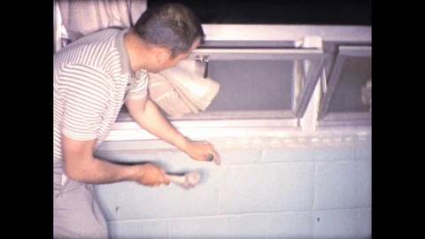 1960s Window Frame Installation Building Construction Vintage Film Home Movie Stock Footage